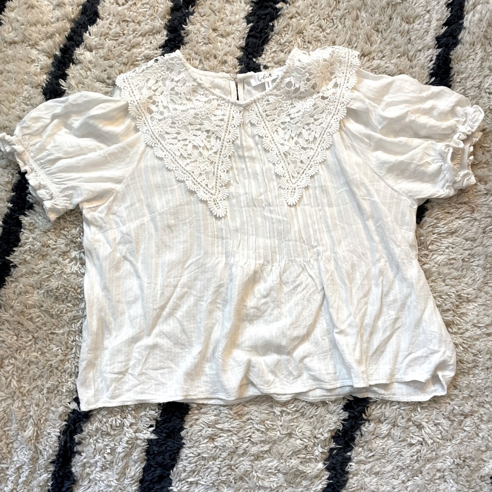 Calista M White Lacy Top with Puff Short Sleeves and Button Closure